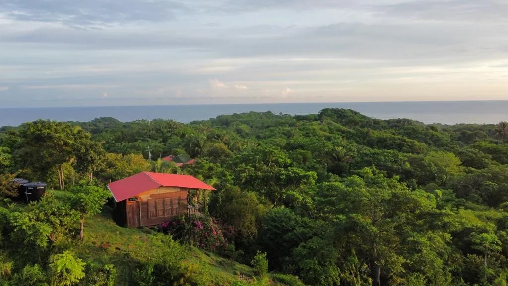 Boutique cabin with Caribbean ocean view — eco lodge investment property near Tayrona Colombia